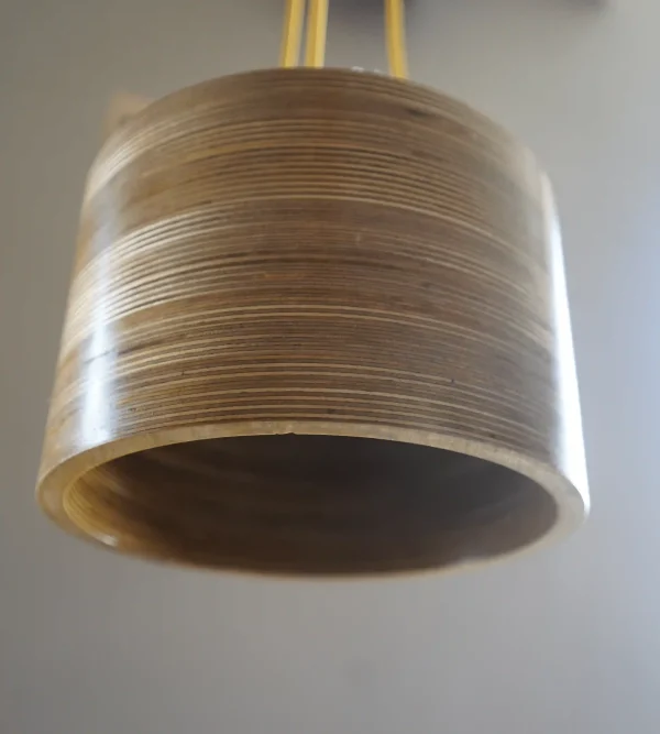 Contemporary 3 Bulb Round Pendant Light with exposed plywood look & hanging from green fabric cable