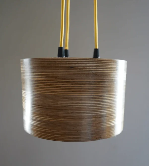 Modern 3 Bulb Round Pendant Light with exposed plywood look & hanging from green fabric cable